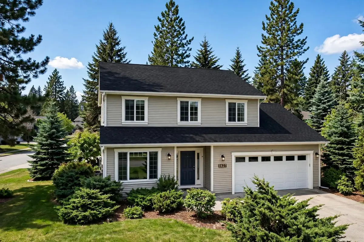 Shoreline home with a clean moss-free roof after soft washing